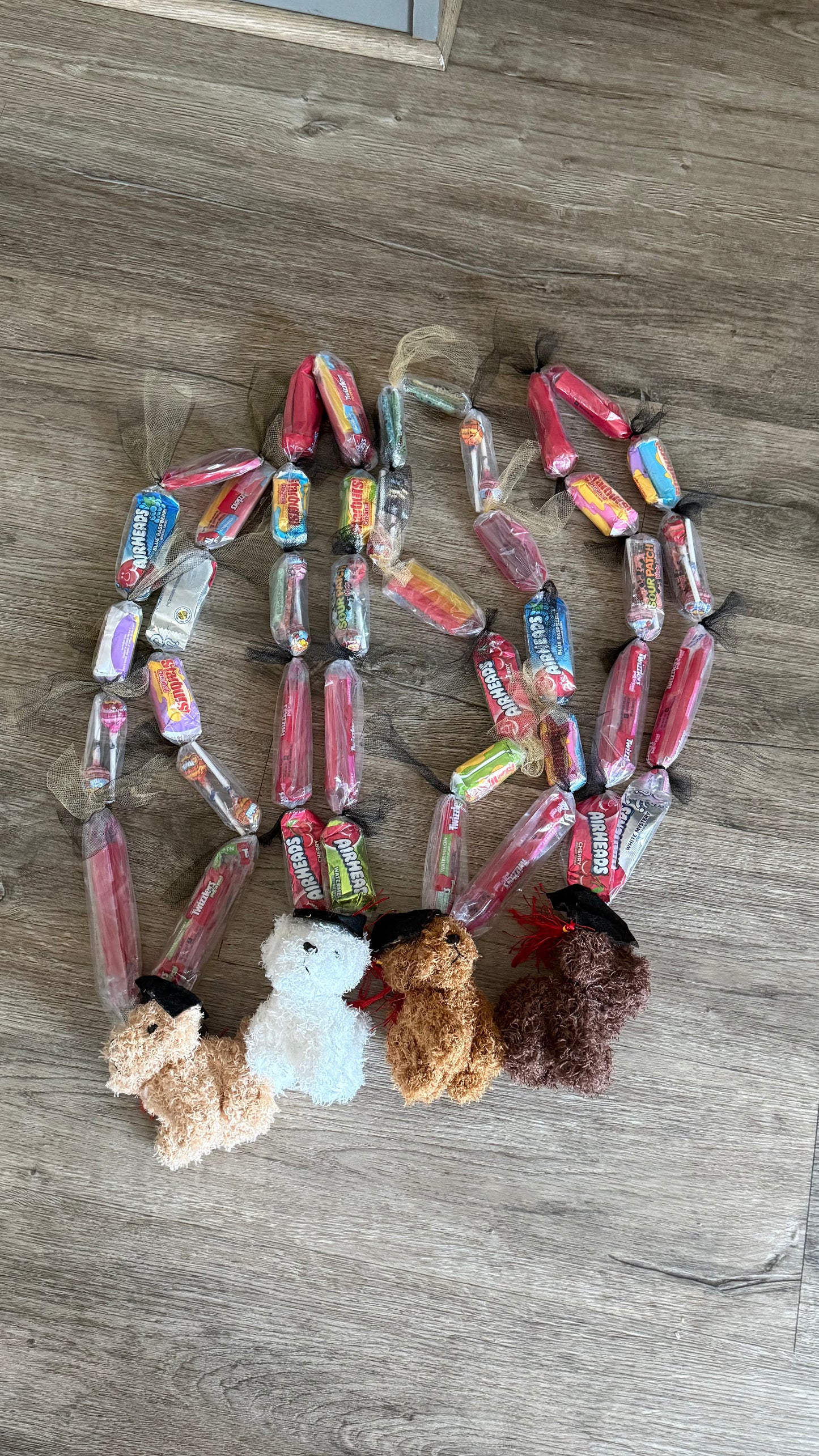 .GRADUATION CANDY LEIS